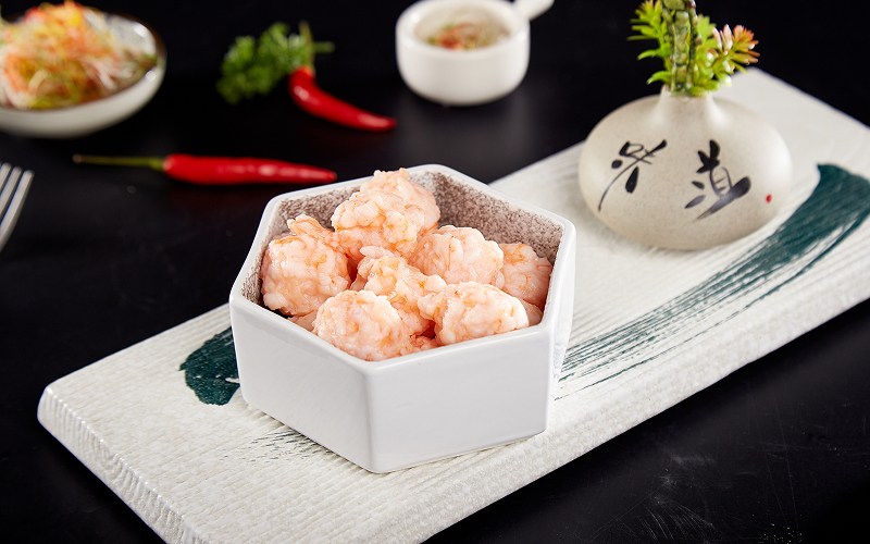 Chinese style homemade shrimp paste balls served in white bowl